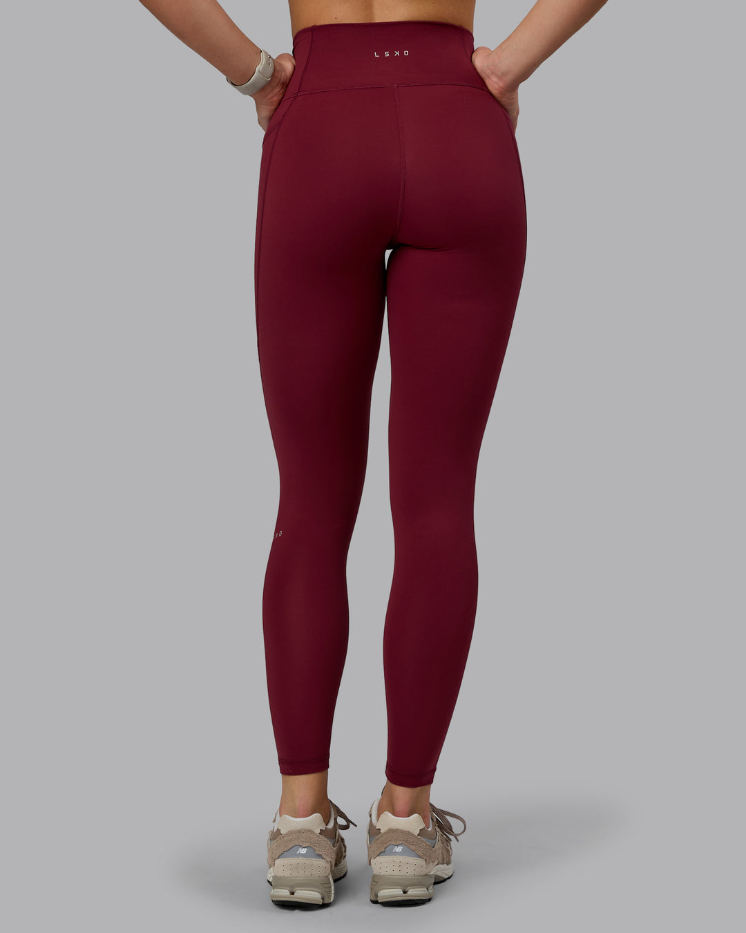 Woman wearing Fusion Ultra High-Rise Full Length Legging Pockets - Cordovan | Model:Chloe | Size:XS - view 2