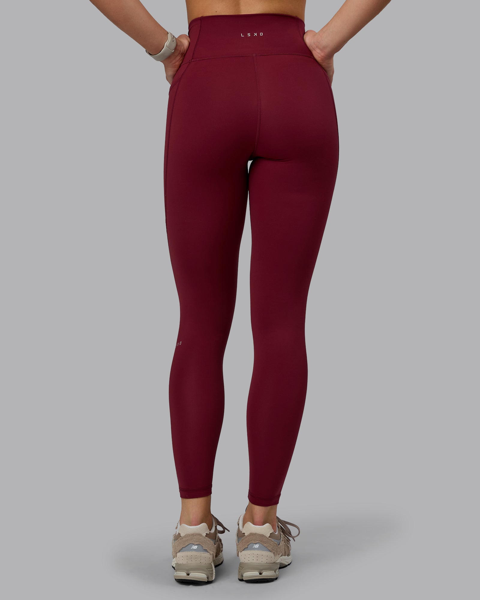 Woman wearing Fusion Ultra High-Rise Full Length Legging Pockets - Cordovan | Model:Chloe | Size:XS