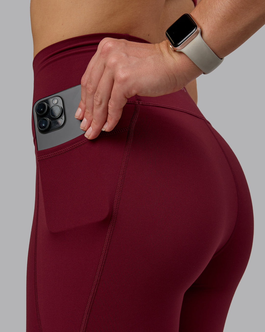 Woman wearing Fusion Ultra High-Rise Full Length Legging Pockets - Cordovan | Model:Chloe | Size:XS - view 5
