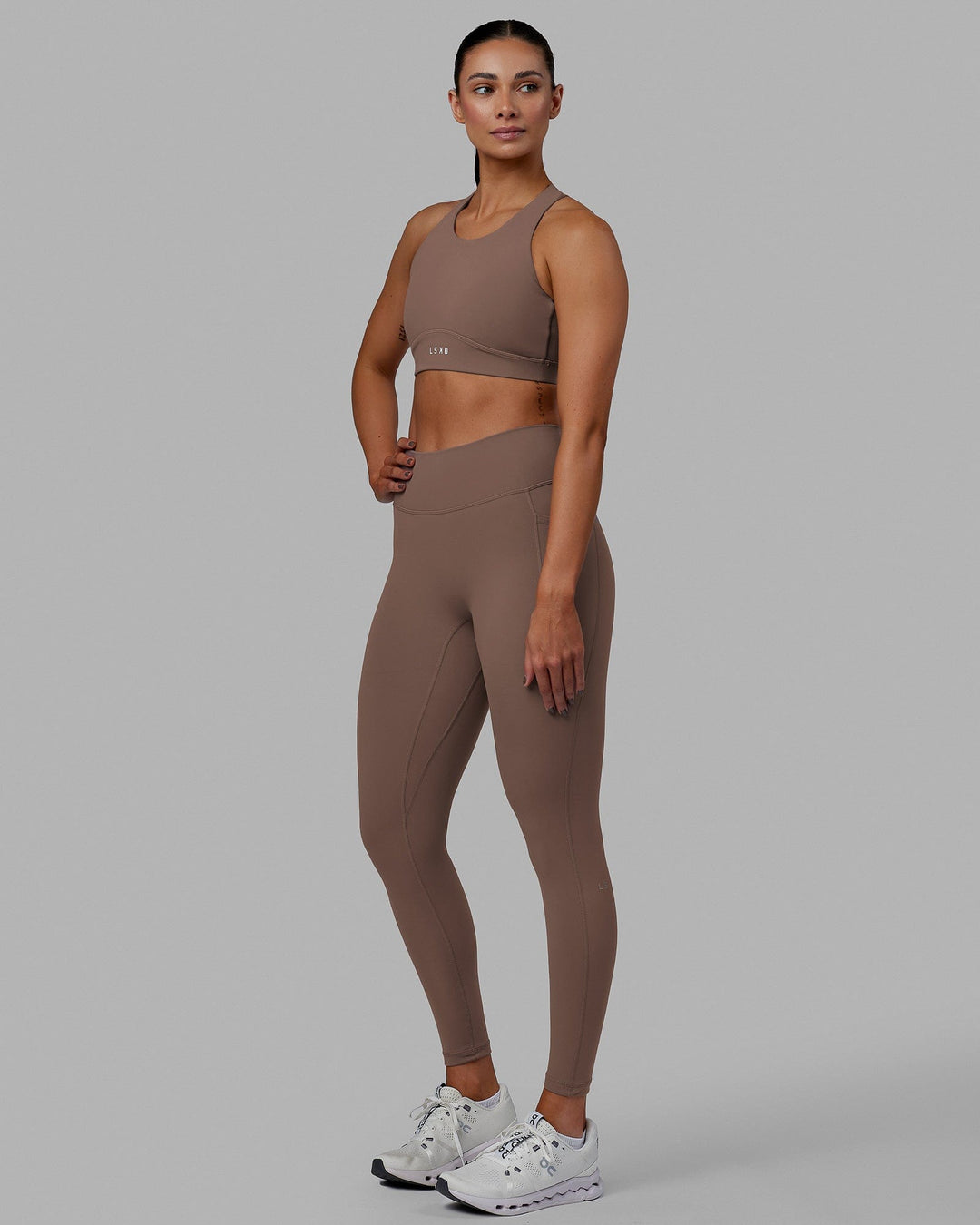 Woman wearing Fusion Ultra High-Rise Full Length Legging Pockets - Deep Taupe | Model:Blaize | Size:S - view 3