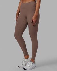 Woman wearing Fusion Ultra High-Rise Full Length Legging Pockets - Deep Taupe | Model:Blaize | Size:S | Thumbnail Index: 0