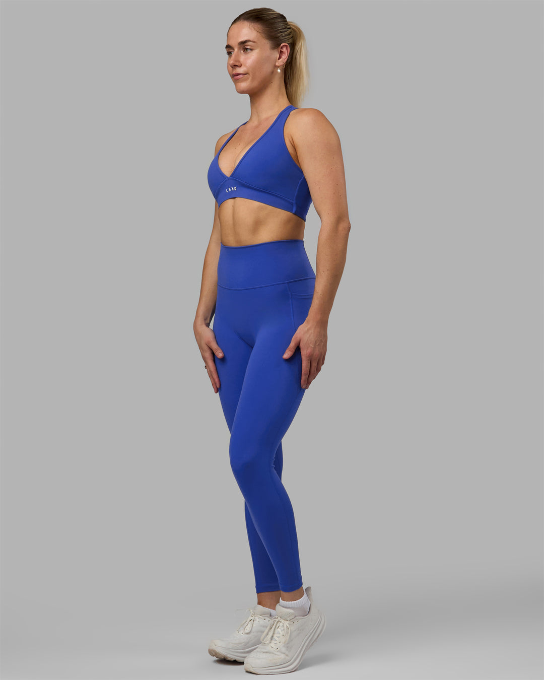 Woman wearing Fusion Ultra High-Rise Full Length Legging Pockets - Power Cobalt | Model:Hannah | Size:S - view 7