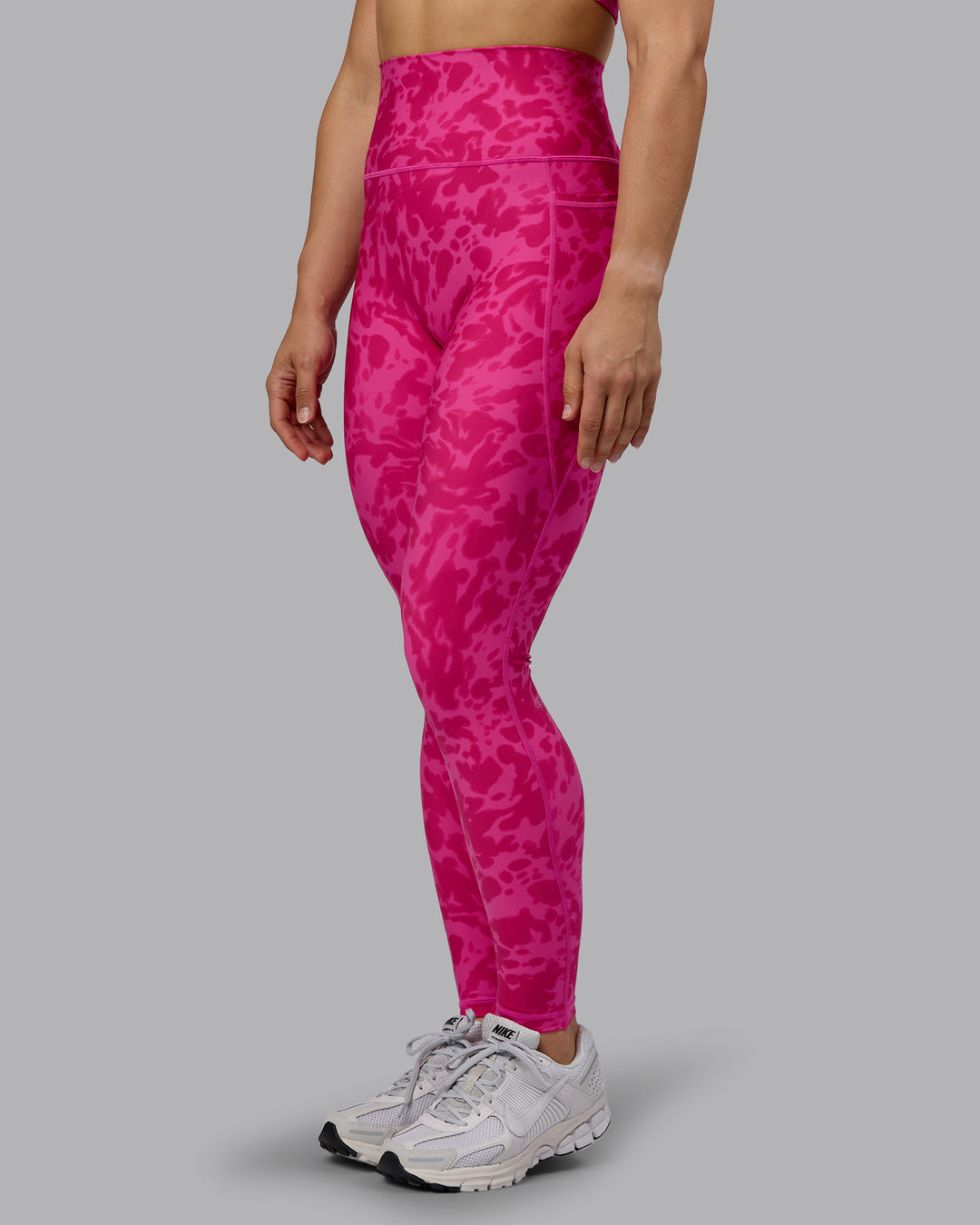 Woman wearing Fusion Ultra High-Rise Full Length Legging Pockets - Strawberry-Lava Lamp | Model:Zoe | Size:S - view 6