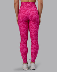 Woman wearing Fusion Ultra High-Rise Full Length Legging Pockets - Strawberry-Lava Lamp | Model:Zoe | Size:S | Thumbnail Index: 2