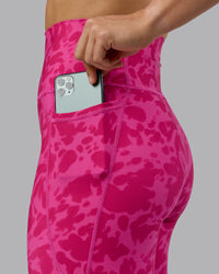 Woman wearing Fusion Ultra High-Rise Full Length Legging Pockets - Strawberry-Lava Lamp | Model:Zoe | Size:S | Thumbnail Index: 3