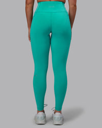 Woman wearing Fusion Ultra High-Rise Full Length Legging Pockets - Turquoise Tide | Model:Hannah | Size:S | Thumbnail Index: 2