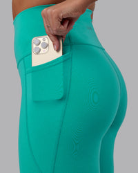 Woman wearing Fusion Ultra High-Rise Full Length Legging Pockets - Turquoise Tide | Model:Hannah | Size:S | Thumbnail Index: 6