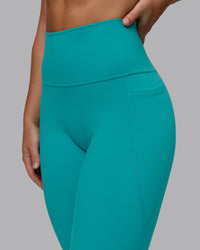 Woman wearing Fusion Ultra High-Rise Full Length Legging Pockets - Uplift Blue | Model:Monique | Size:S | Thumbnail Index: 8