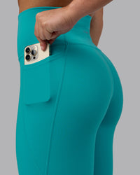 Woman wearing Fusion Ultra High-Rise Full Length Legging Pockets - Uplift Blue | Model:Monique | Size:S | Thumbnail Index: 5