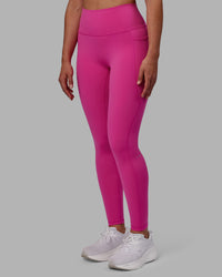 Woman wearing Fusion Ultra High-Rise Full Length Legging Pockets - Fuchsia Pink | Model:Sophie | Size:S | Thumbnail Index: 4