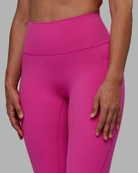 Woman wearing Fusion Ultra High-Rise Full Length Legging Pockets - Fuchsia Pink | Model:Sophie | Size:S | Thumbnail Index: 5