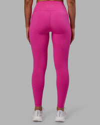 Woman wearing Fusion Ultra High-Rise Full Length Legging Pockets - Fuchsia Pink | Model:Sophie | Size:S | Thumbnail Index: 2