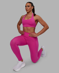 Woman wearing Fusion Ultra High-Rise Full Length Legging Pockets - Fuchsia Pink | Model:Sophie | Size:S | Thumbnail Index: 6