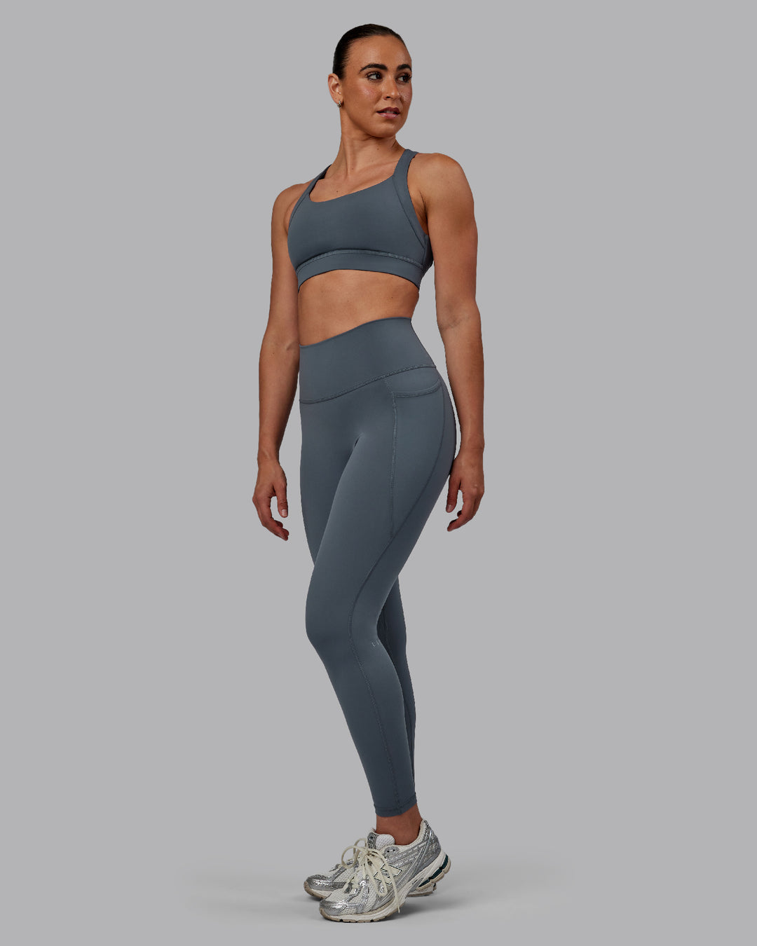 Woman wearing Fusion Ultra High-Rise Full Length Legging Pockets - Turbulence | Model:Sophie | Size:S - view 5