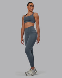 Woman wearing Fusion Ultra High-Rise Full Length Legging Pockets - Turbulence | Model:Sophie | Size:S | Thumbnail Index: 4