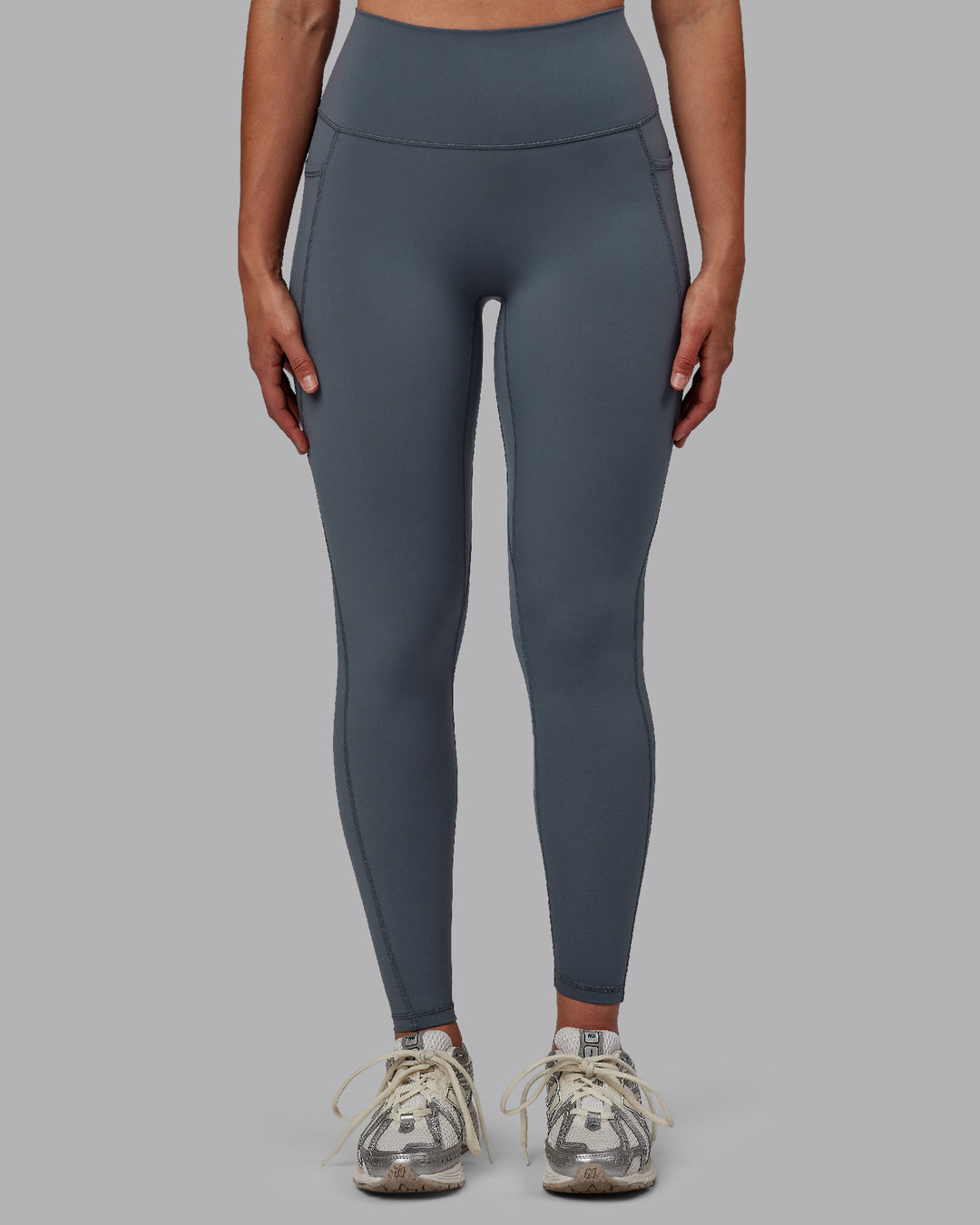 Woman wearing Fusion Ultra High-Rise Full Length Legging Pockets - Turbulence | Model:Sophie | Size:S - view 8