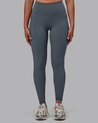 Woman wearing Fusion Ultra High-Rise Full Length Legging Pockets - Turbulence | Model:Sophie | Size:S | Thumbnail Index: 7