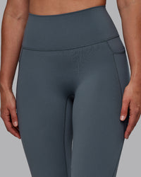 Woman wearing Fusion Ultra High-Rise Full Length Legging Pockets - Turbulence | Model:Sophie | Size:S | Thumbnail Index: 3