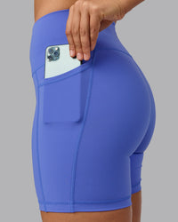 Woman wearing Fusion Ultra High-Rise 6" Short Pockets - Baja Blue | Set:true | Angle:closeup | Model:Sophie | Size:S | Thumbnail Index: 3