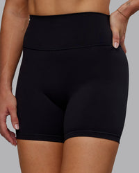 Woman wearing Fusion Ultra High-Rise 6" Short - Black | Set:true | Angle:closeup | Model:Hannah | Size:S | Thumbnail Index: 8