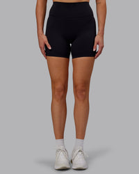 Woman wearing Fusion Ultra High-Rise 6" Short - Black | Set:true | Angle:front | Model:Hannah | Size:S | Thumbnail Index: 7