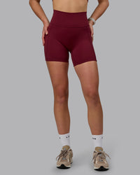 Woman wearing Fusion Ultra High-Rise 6" Short Pockets - Cordovan | Model:Chloe | Size:XS | Thumbnail Index: 6