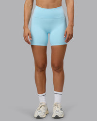 Woman wearing Fusion Ultra High-Rise 6" Short Pockets - Crystal Blue | Set:true | Angle:front | Model:Sophie | Size:S | Thumbnail Index: 7