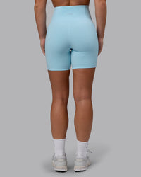 Woman wearing Fusion Ultra High-Rise 6" Short Pockets - Glacial Blue | Model:Monique | Size:S | Thumbnail Index: 3