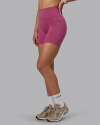 Woman wearing Fusion Ultra High-Rise 6" Short Pockets - Mauve Haze | Model:Chloe | Size:XS | Thumbnail Index: 0