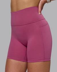 Woman wearing Fusion Ultra High-Rise 6" Short Pockets - Mauve Haze | Model:Chloe | Size:XS | Thumbnail Index: 6