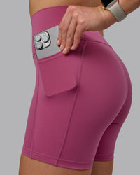 Woman wearing Fusion Ultra High-Rise 6" Short Pockets - Mauve Haze | Model:Chloe | Size:XS | Thumbnail Index: 5