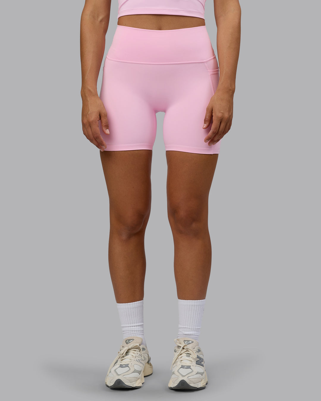 Woman wearing Fusion Ultra High-Rise 6" Short Pockets - Pale Pink | Model:Sophie | Size:S - view 8