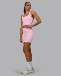 Woman wearing Fusion Ultra High-Rise 6" Short Pockets - Pale Pink | Model:Sophie | Size:S | Thumbnail Index: 4