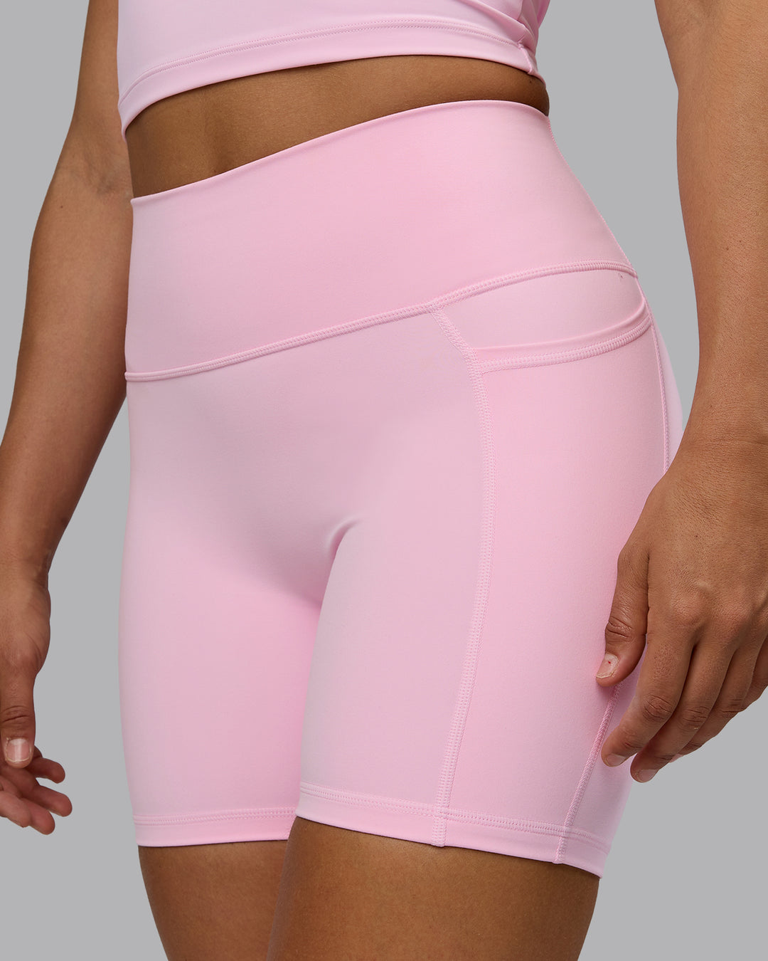 Woman wearing Fusion Ultra High-Rise 6" Short Pockets - Pale Pink | Model:Sophie | Size:S - view 4