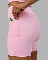 Woman wearing Fusion Ultra High-Rise 6" Short Pockets - Pale Pink | Model:Sophie | Size:S | Thumbnail Index: 5