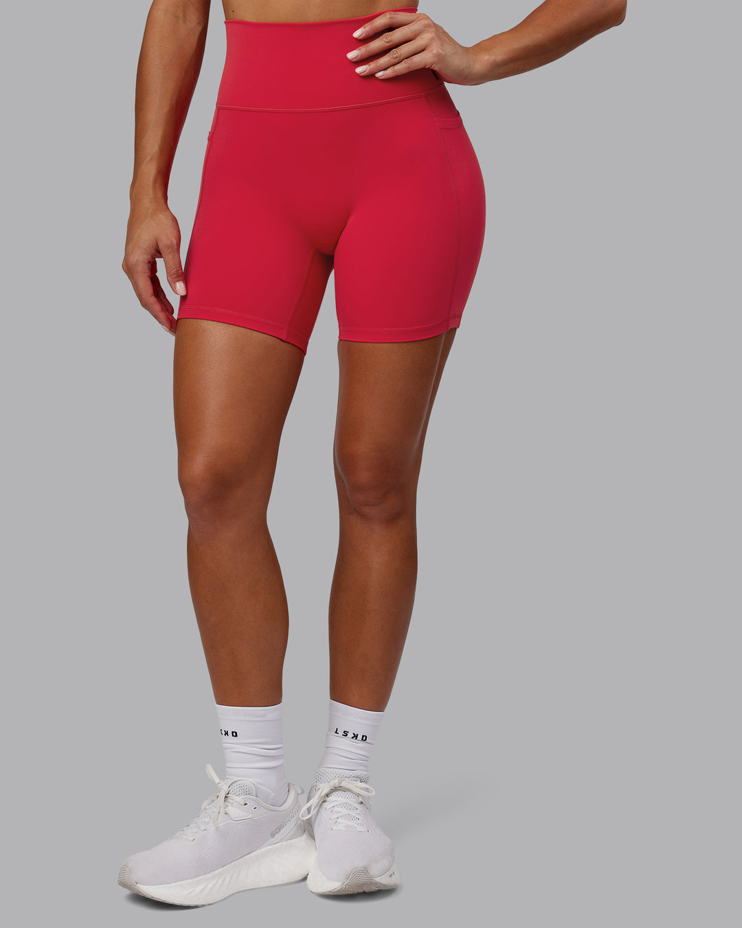 Woman wearing Fusion Ultra High-Rise 6" Short Pockets - Scarlet | Model:Demi | Size:S - view 5