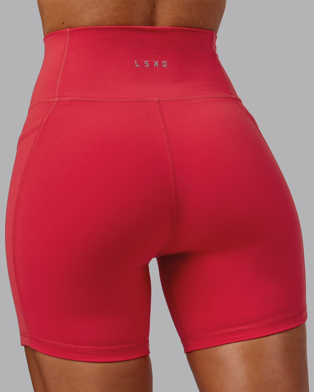 Woman wearing Fusion Ultra High-Rise 6" Short Pockets - Scarlet | Model:Demi | Size:S - view 6