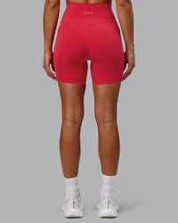 Woman wearing Fusion Ultra High-Rise 6" Short Pockets - Scarlet | Model:Demi | Size:S | Thumbnail Index: 2
