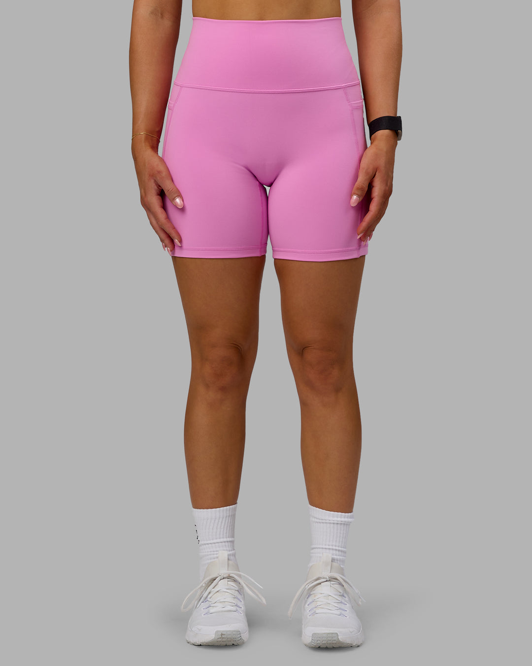Woman wearing Fusion Ultra High-Rise 6" Short Pockets - Spark Pink | Model:Halle | Size:S - view 8