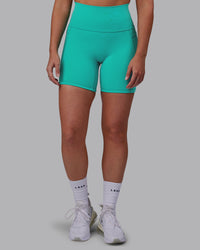 Woman wearing Fusion Ultra High-Rise 6" Short Pockets - Turquoise Tide | Model:Hannah | Size:S | Thumbnail Index: 7