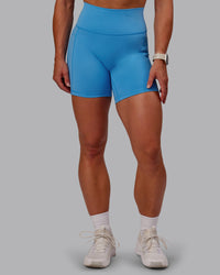 Woman wearing Fusion Ultra High-Rise 6" Short Pockets - Azure Blue | Model:Amber | Size:S | Thumbnail Index: 7