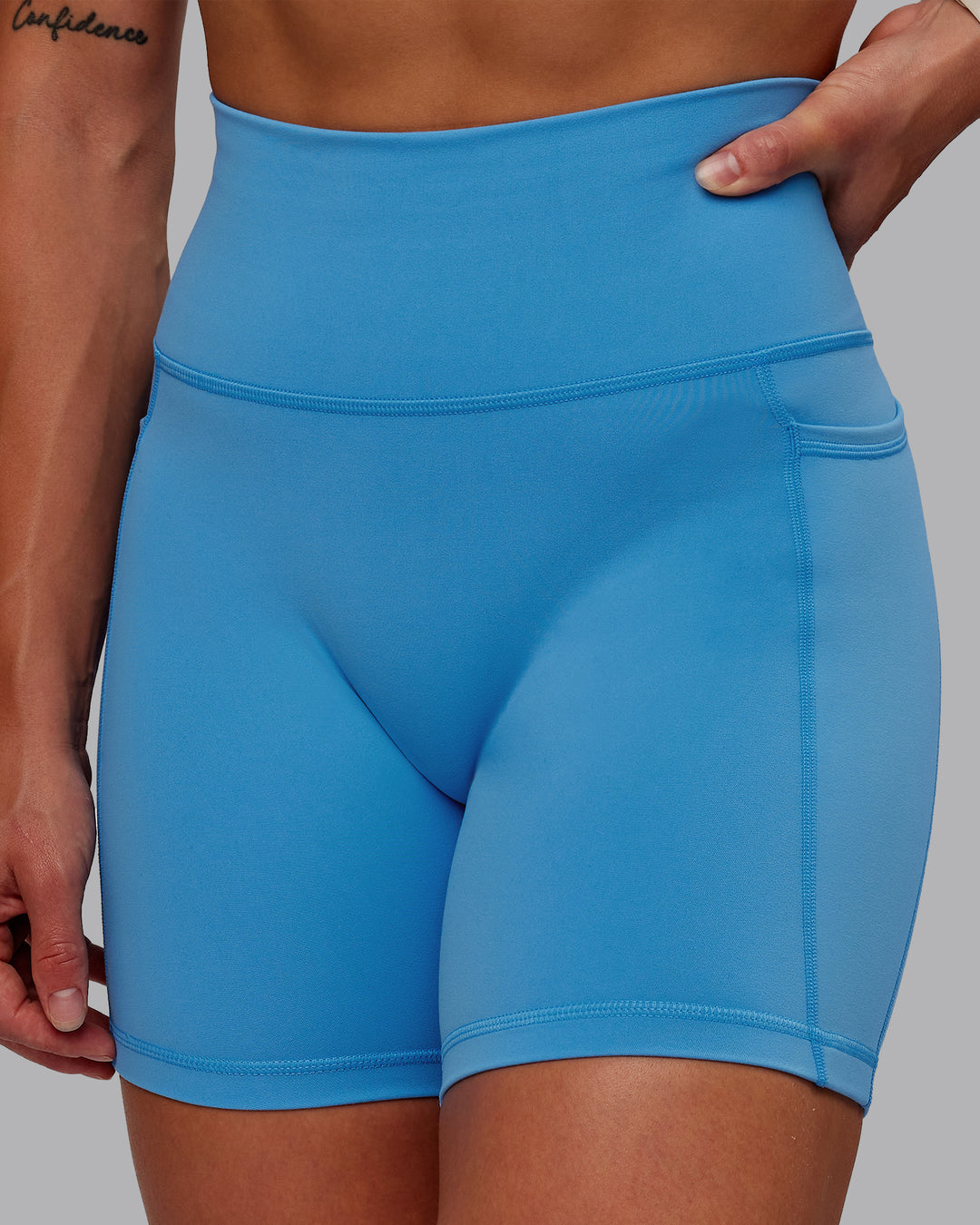 Woman wearing Fusion Ultra High-Rise 6" Short Pockets - Azure Blue | Model:Amber | Size:S - view 6