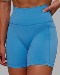 Woman wearing Fusion Ultra High-Rise 6" Short Pockets - Azure Blue | Model:Amber | Size:S | Thumbnail Index: 5