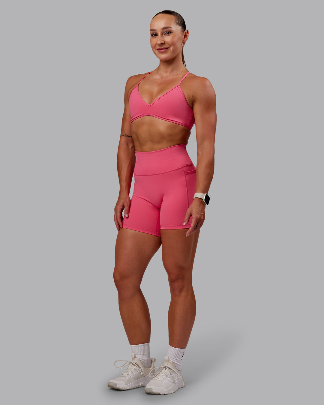 Woman wearing Fusion Ultra High-Rise 6" Short Pockets - Hot Pink | Model:Amber | Size:S - view 5