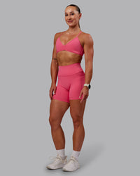 Woman wearing Fusion Ultra High-Rise 6" Short Pockets - Hot Pink | Model:Amber | Size:S | Thumbnail Index: 4