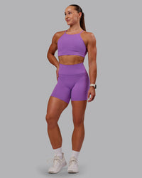 Woman wearing Fusion Ultra High-Rise 6" Short Pockets - Purple Fizz | Model:Amber | Size:S | Thumbnail Index: 0