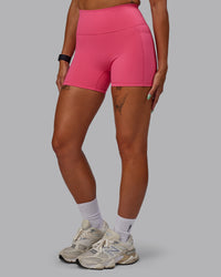 Woman wearing Fusion Ultra High-Rise 4" Short Pockets - Hot Pink | Model:Vanessa | Size:S | Thumbnail Index: 5