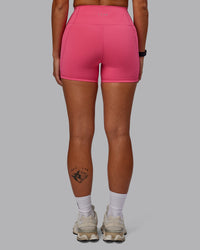 Woman wearing Fusion Ultra High-Rise 4" Short Pockets - Hot Pink | Model:Vanessa | Size:S | Thumbnail Index: 3