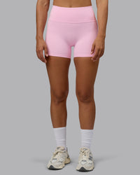 Woman wearing Fusion Ultra High-Rise 4" Short Pockets - Pale Pink | Model:Sophie | Size:S | Thumbnail Index: 8