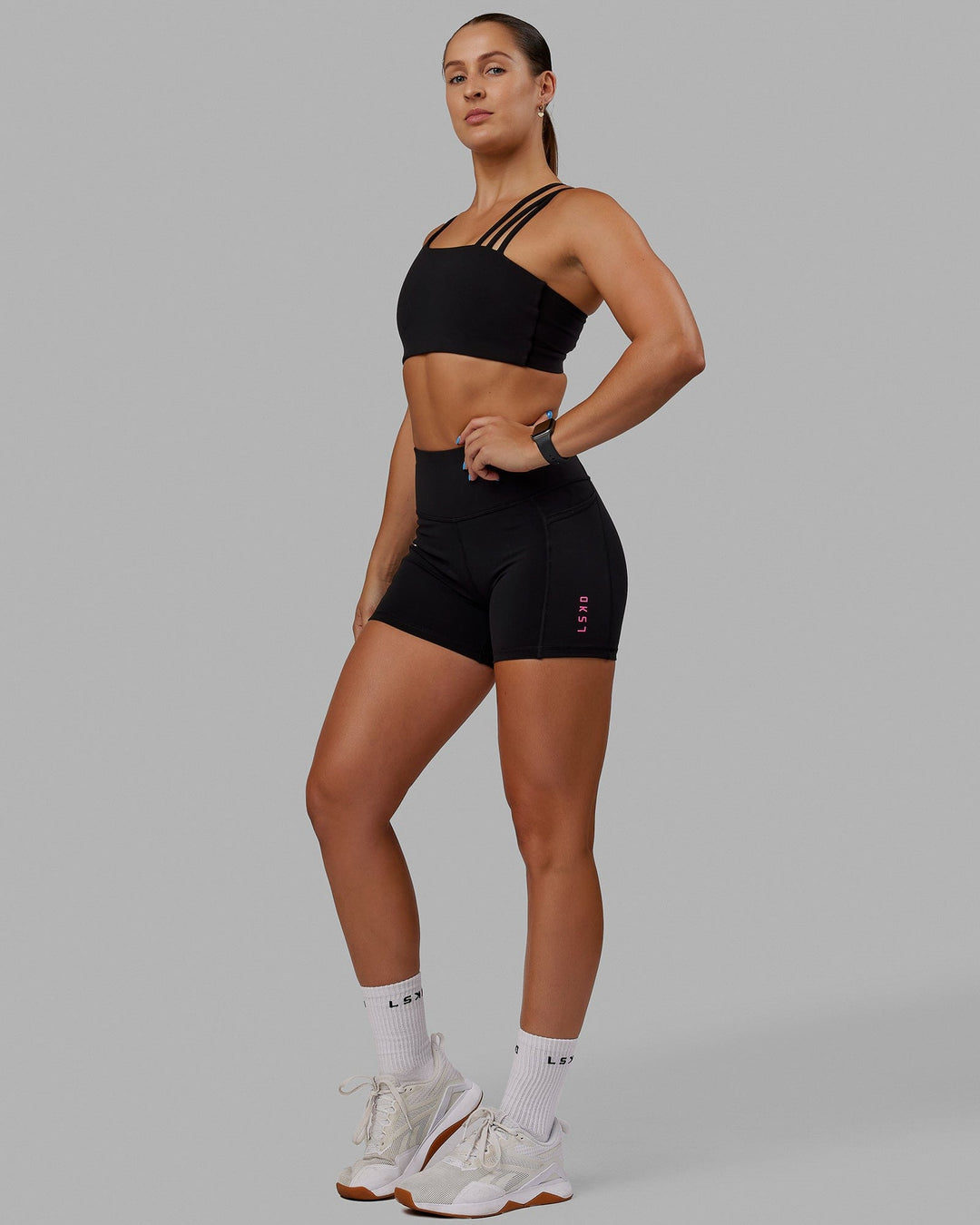 Woman wearing Galvanise Sports Bra - Black - view 3